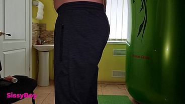 TANNED ASS AFTER A SOLARIUM. CROSSDRESSER IN A CHASTITY BELT IN A THONG FROM A TANNING BED.