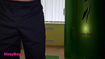 TANNED ASS AFTER A SOLARIUM. CROSSDRESSER IN A CHASTITY BELT IN A THONG FROM A TANNING BED.