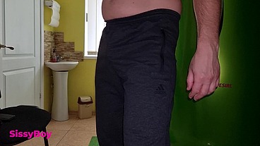 TANNED ASS AFTER A SOLARIUM. CROSSDRESSER IN A CHASTITY BELT IN A THONG FROM A TANNING BED.