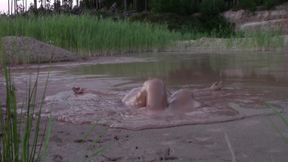 Mud Bath in Deep Quarry Mud Pond