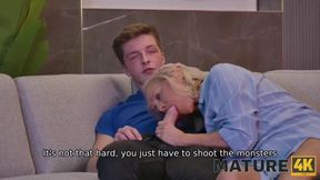 Mature cougar with a shaved pussy gets the ultimate satisfaction of gaming