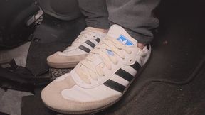 Amelie drives back from the gas stain wearing her Adidas Samba sneakers