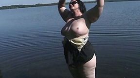 Big fat slut rubs her skin with sun protect lotion before masturbating outdoor
