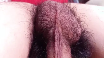 Hairy Asian twink plays with his balls in solo closeup