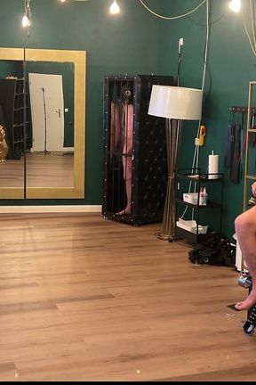 Mature Latex Dominatrix Commands Leashed Naked Slaves