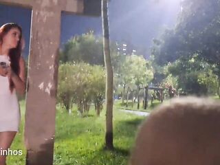 Risky masturbation with a pretty redhead at the bus stop!