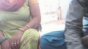 Horny Indian freak shows big tits of his wife on webcam