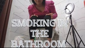 Lola in the bathroom and smoking