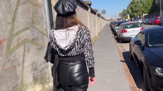 Miss Sandra Domina - Fetish walk and smoking with leather boots and leather leggings