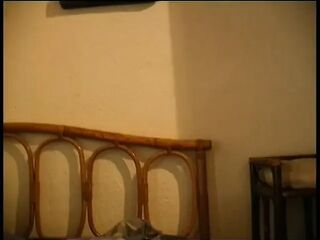 That babe lies down on the table and begins playing with her hawt spot