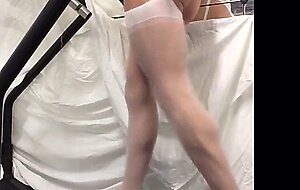 Crossdresser in White Stockings on Treadmill