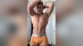 Young muscle hunk flexing in his underwear