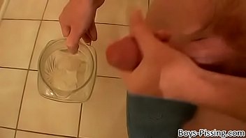 Piss loving young man playing with his cock in a bubble bath