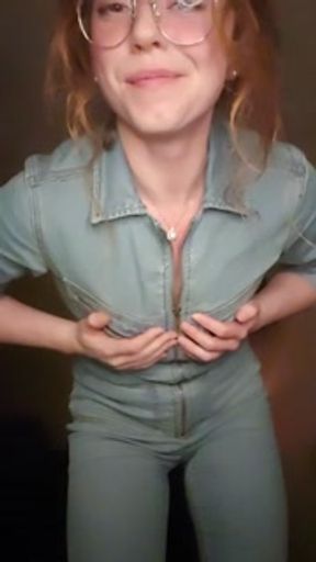 Redhead over jeans tease