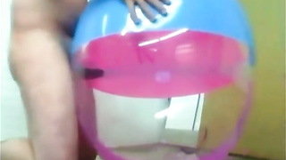 Huge inflatable beach ball nail spunk inwards