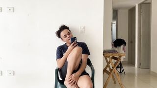 Tranny speaking from her smartphone