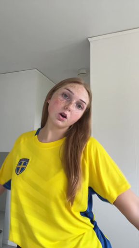 Soccer fan in yellow and blue jersey