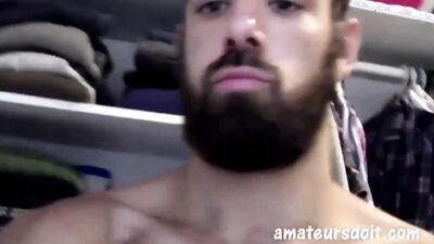 Attractive stud with a sexy beard uses a fleshlight to masturbate