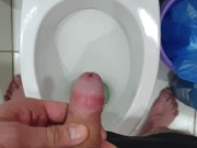 Pissing in toilet