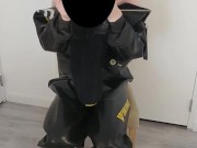 Putting on heavy rubber Viking drysuit, gasmask, latex mask and condom