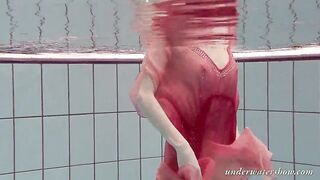 Katya Okuneva gets naked into her red panties underwater