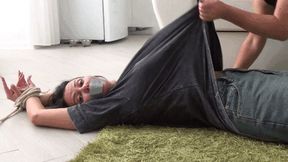 LORY squirms cries and struggles against the tickling Ta