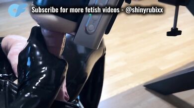 Fucked in latex with automatic masturbator