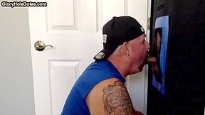 Tattooed gloryhole amateur DILF sucks and wanks cock