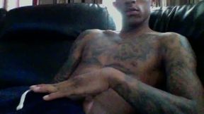 Tatted Black Guy Lounging