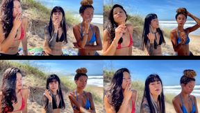 Latinas smoking in bikinis on the beach