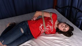 Anita: barefoot girl, dressed in red t-shirt and blue jeans, hogtied with hemp rope, rolls and wiggles on the bed (HD MOV)