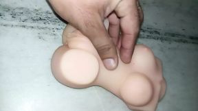 Boy play with sex doll boobs