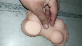 Boy play with sex doll boobs