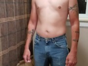 Hot guy pissing his jeans!