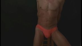 Part 2 - Down In the Dark - Groin Stretching on the Stool with Dark Background and Bright Briefs - with the light off
