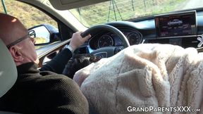 Naughty MILF gives handjob and blowjob to young stud while driving