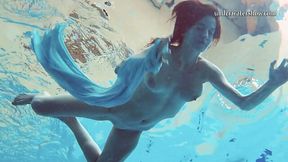 Big tittied swimming bitch Piyavka Chehova shows striptease under the water