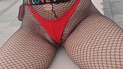Captured heat shows ass under micro bikini