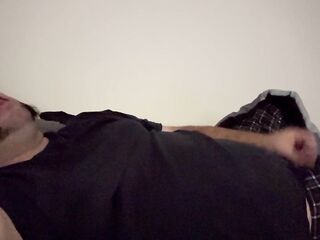 Fat man masturbates to climax and cum in daybed