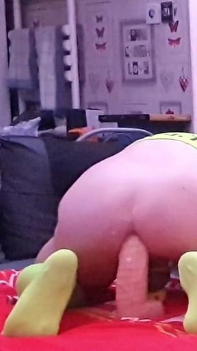 Cock Locked in Chastity While Anal Fucking a Big White Dildo