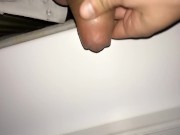 Teen piss out of a window in a entrance of apartment building - Rainy night