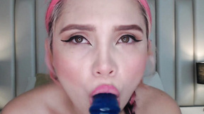 GabiMillis sucking on her blue dildo