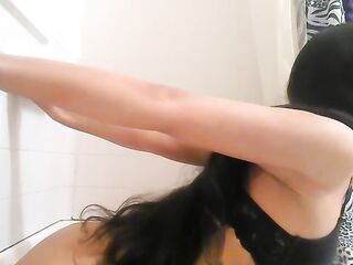 T-girl brunette hair using vibrator on her butt