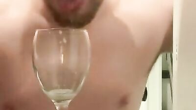 Cum thiraty bloke is spitting in glass while filming himself