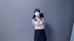 GG81-A cute Asian girl dances after being bound by ropes.