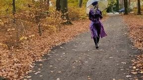 Rubbermissy Park stroll in purple rubber catsuit and shiny transparent PVC Rainmac raincoat