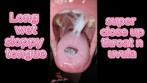 Tongue mouth and throat super close up of sexy girl with a lot of spit gagging and hocking with tongue piercing