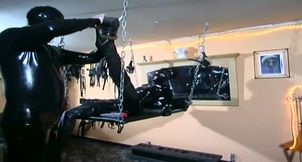 Bdsm with masked girl in latex