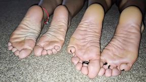 Showing off both our soles before fore she Peggs my ass for the first time