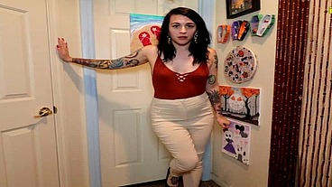 Mia Hope pissing her dress pants outside bathroom